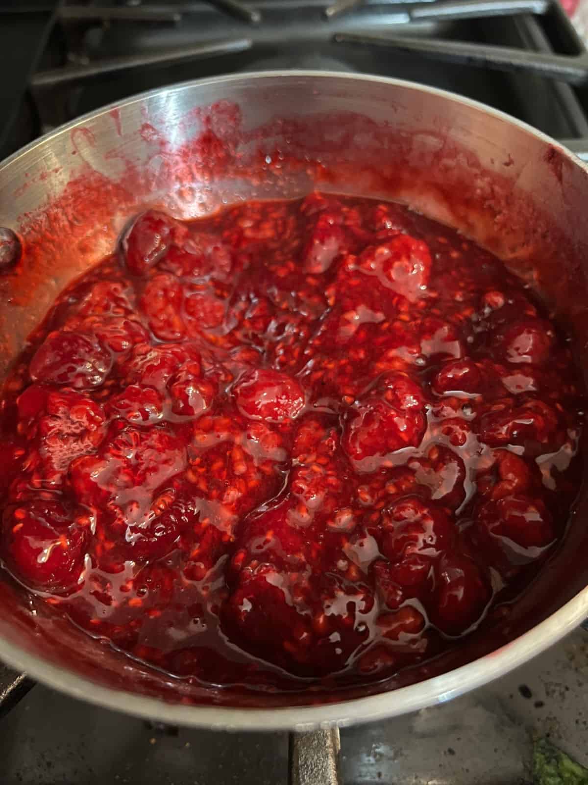 keto raspberry sauce cooking.
