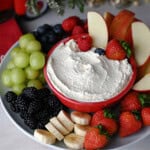 Cool Whip dip surrounded by dippable fruit.