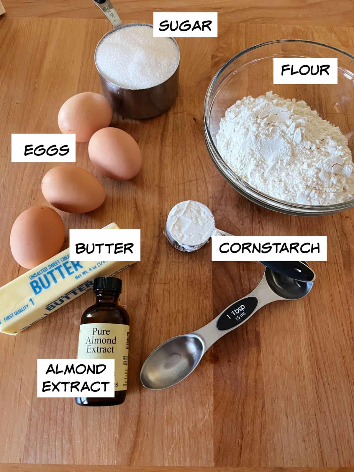ingredients: eggs, flour, sugar, cornstarch, butter, and almond extract.