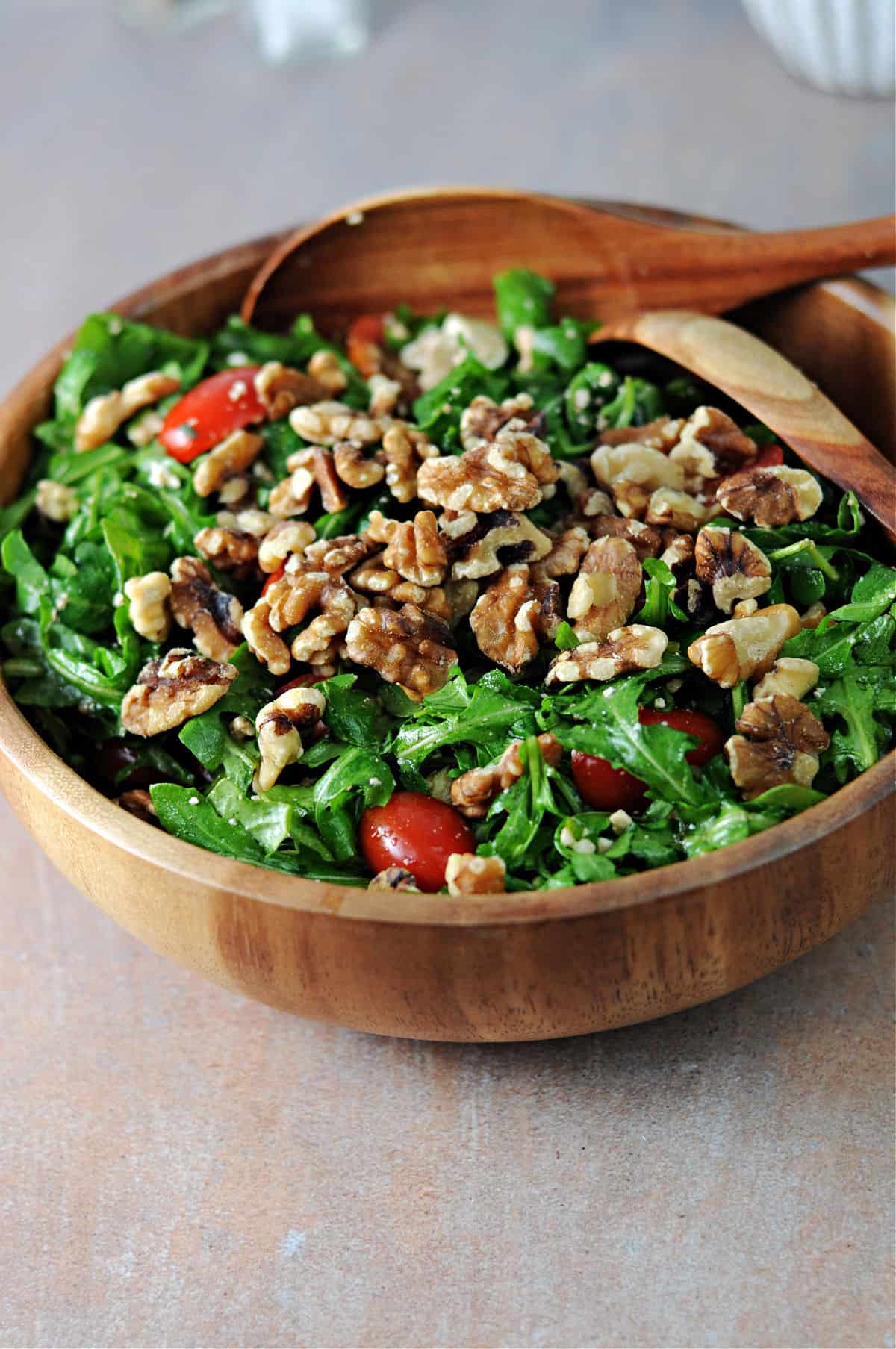 arugula feta tomato salad with walnuts added.