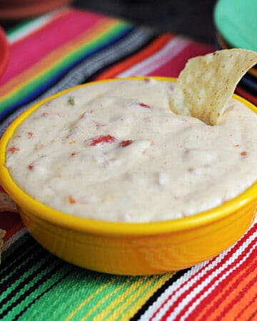 yellow bowl of Monterey Jack queso dip ready to be served.
