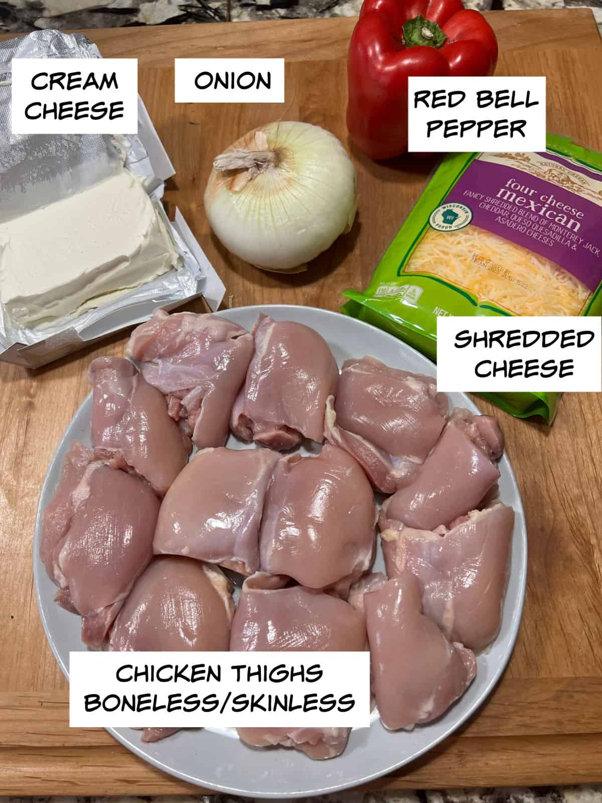 ingredients: chicken thighs, cream cheese, onion, red bell pepper, shredded cheese.
