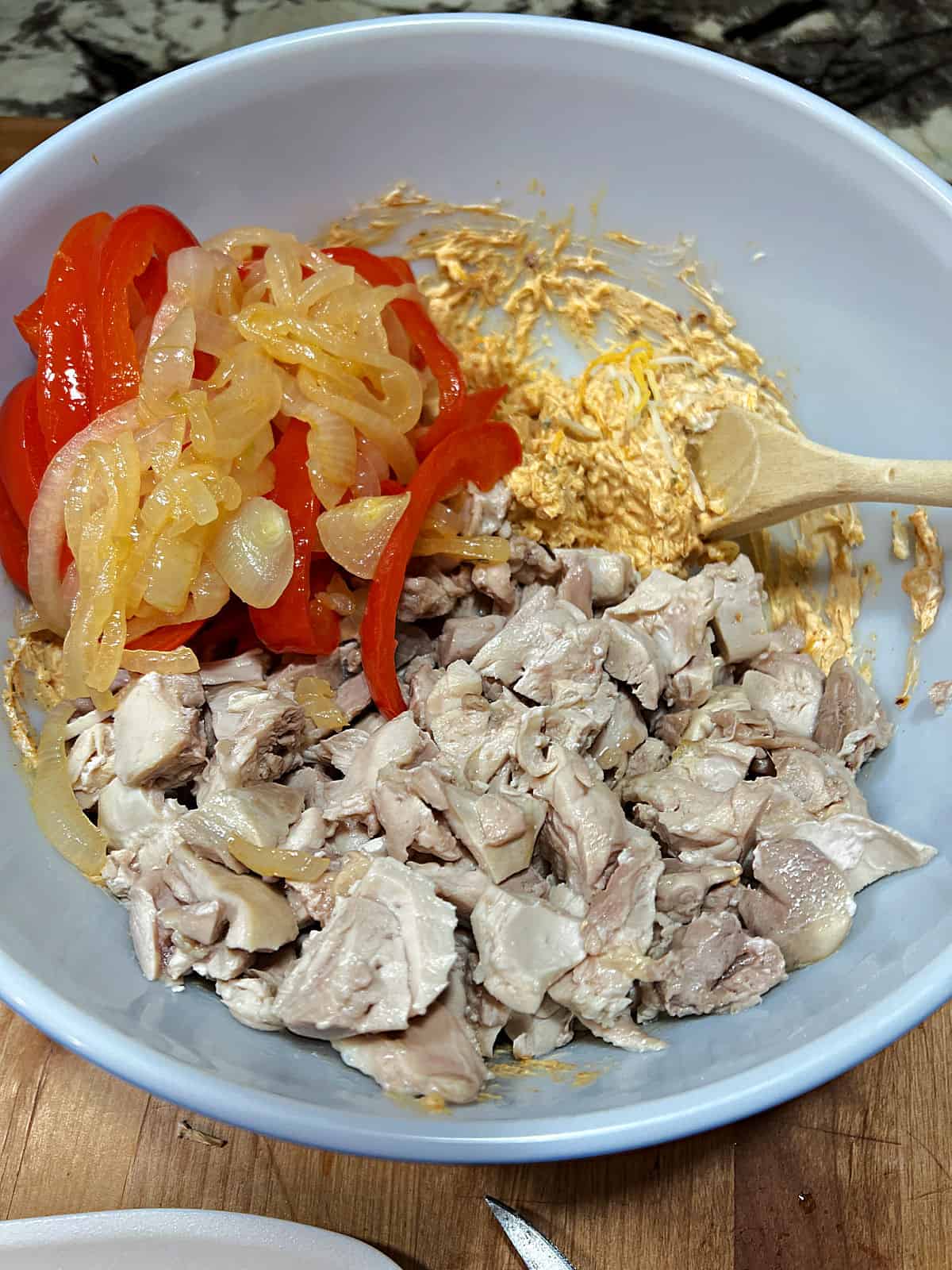 all casserole ingredients in a mixing bowl.