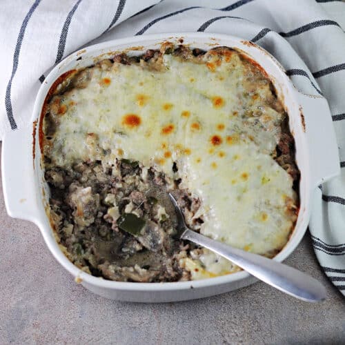 square baking dish of philly cheesesteak casserole.