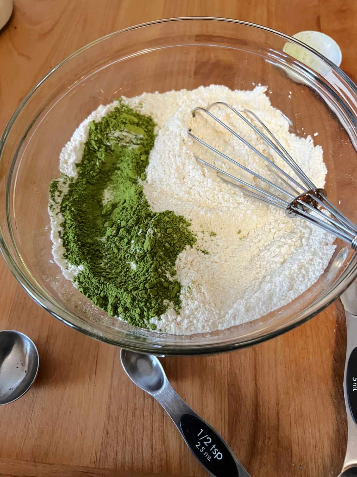 dry ingredients in a bowl about to be whisked together.