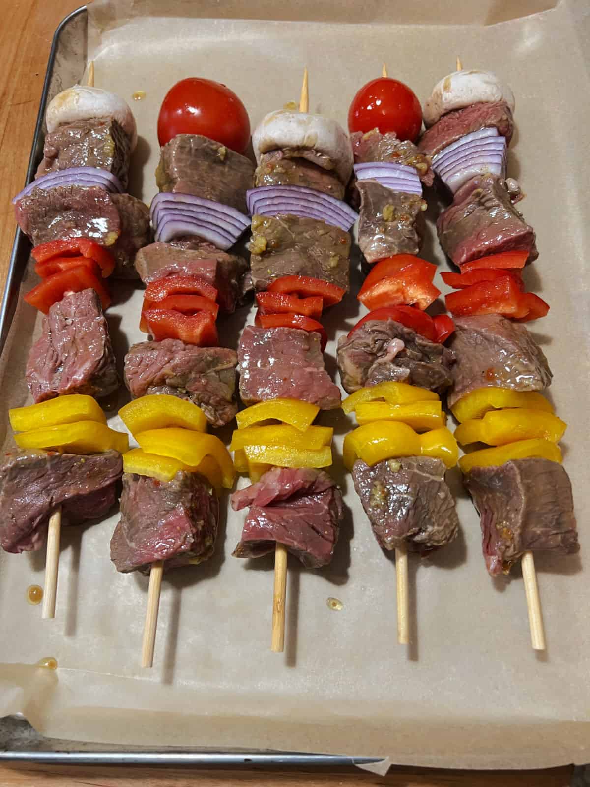 5 skewers loaded with beef and veggies.