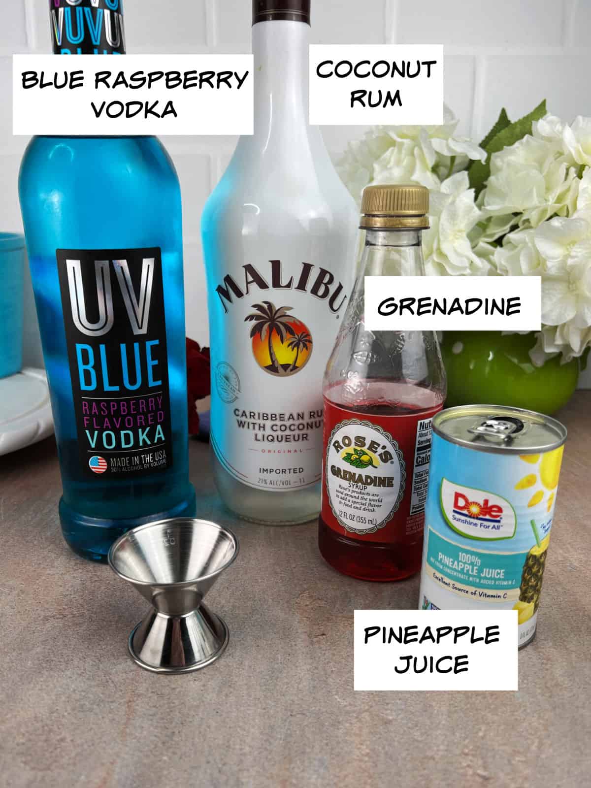 Ingredients: blue raspberry vodka, coconut rum, grenadine, pineapple juice.
