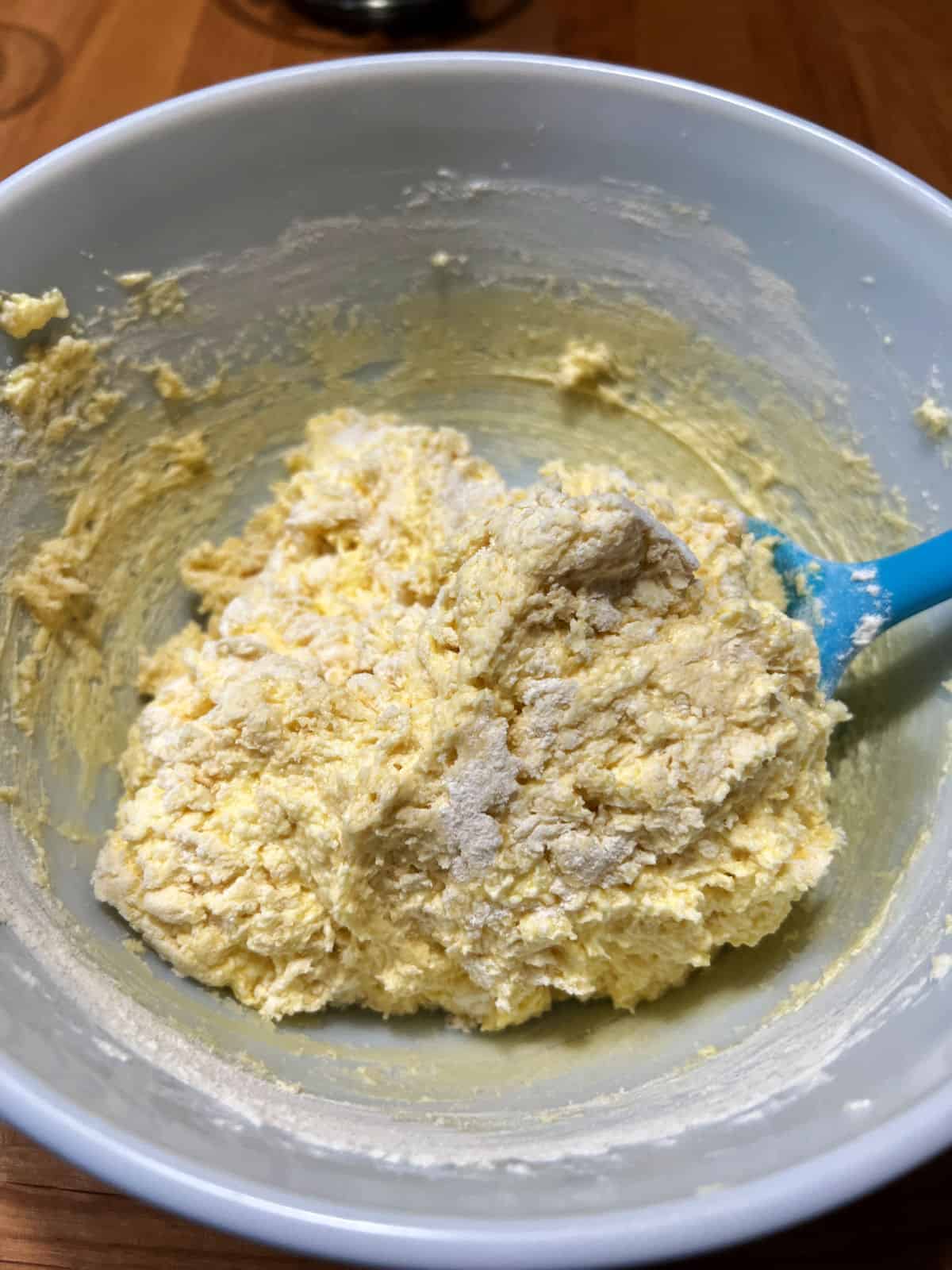 Muffin batter stirred to just combine the dry ingredients with the wet.