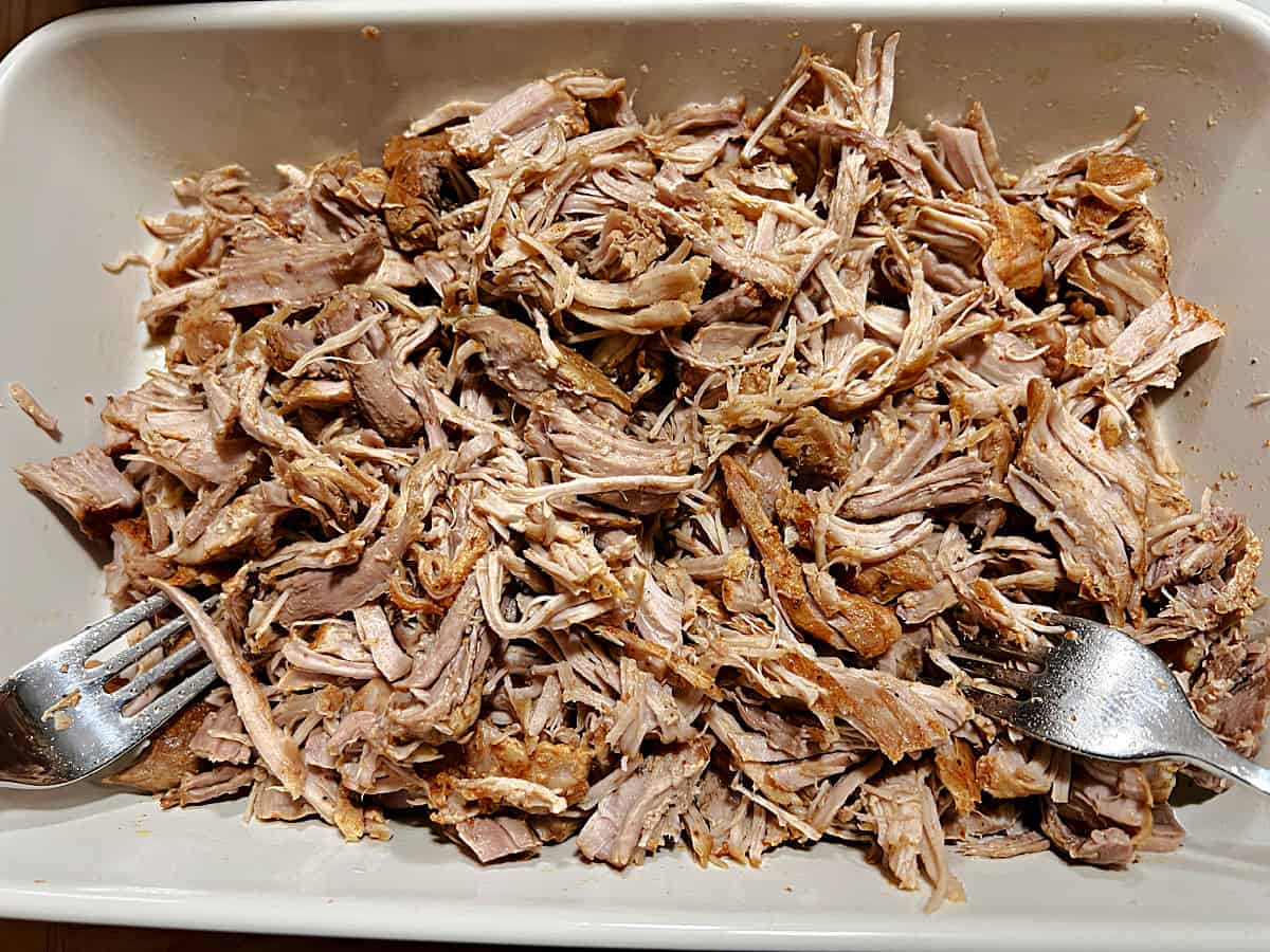 Pan of shredded pulled pork made in the Instant Pot.