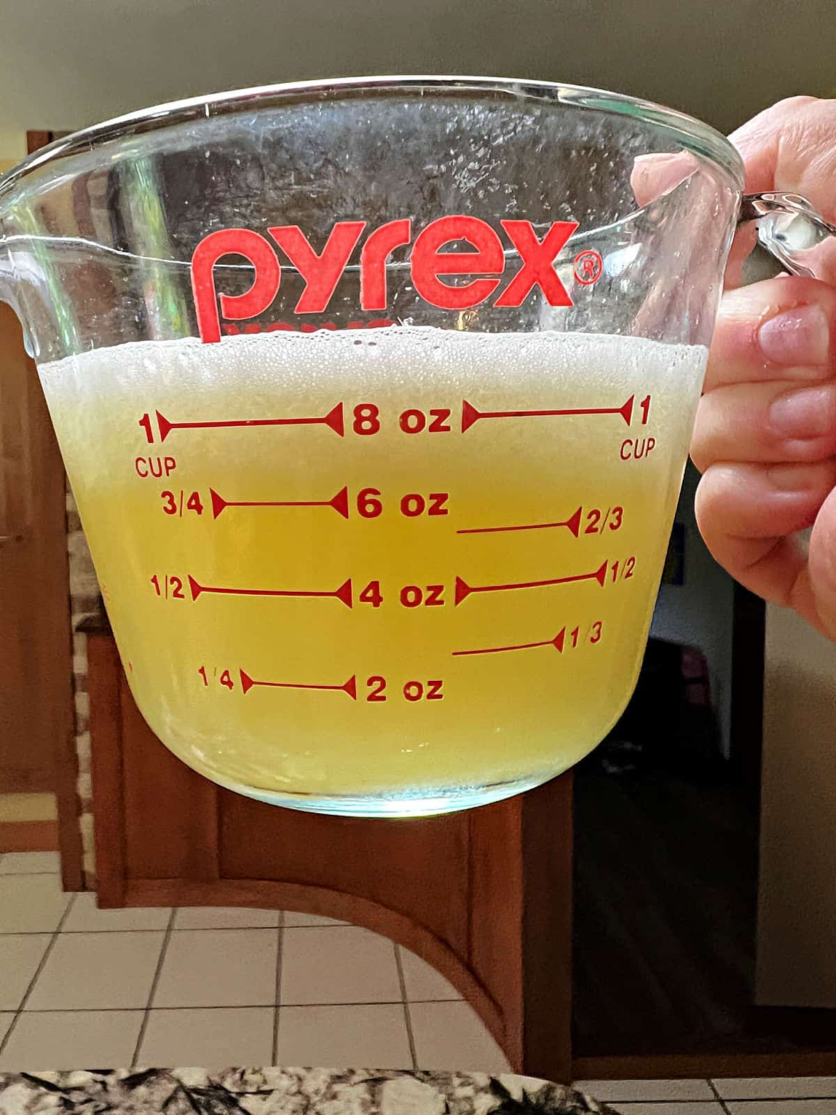 measuring cup of fresh squeezed lemon juice.