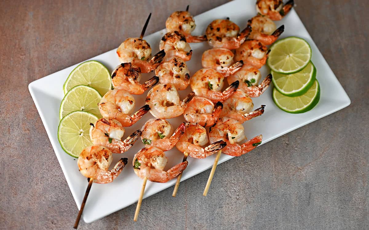 platter of grilled shrimp skewers