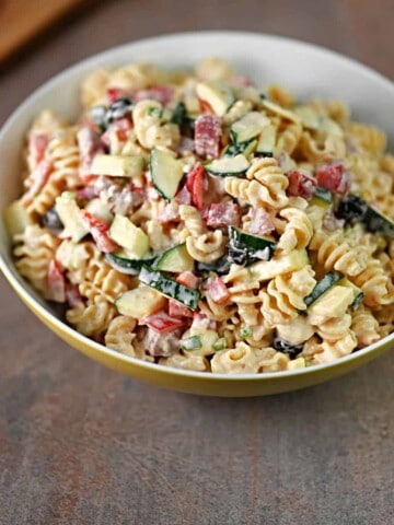 Serving bowl of salami pasta salad.