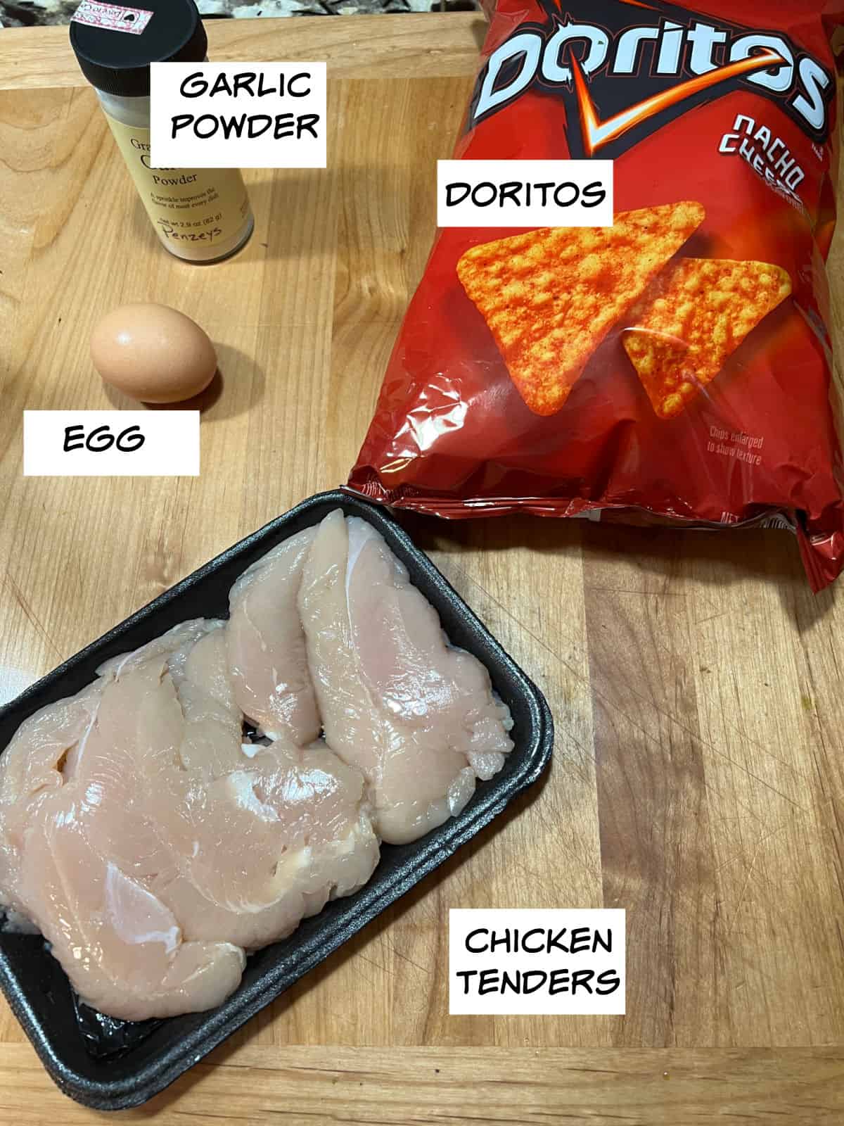 Ingredients: garlic powder, Doritos, chicken tenders, and an egg.