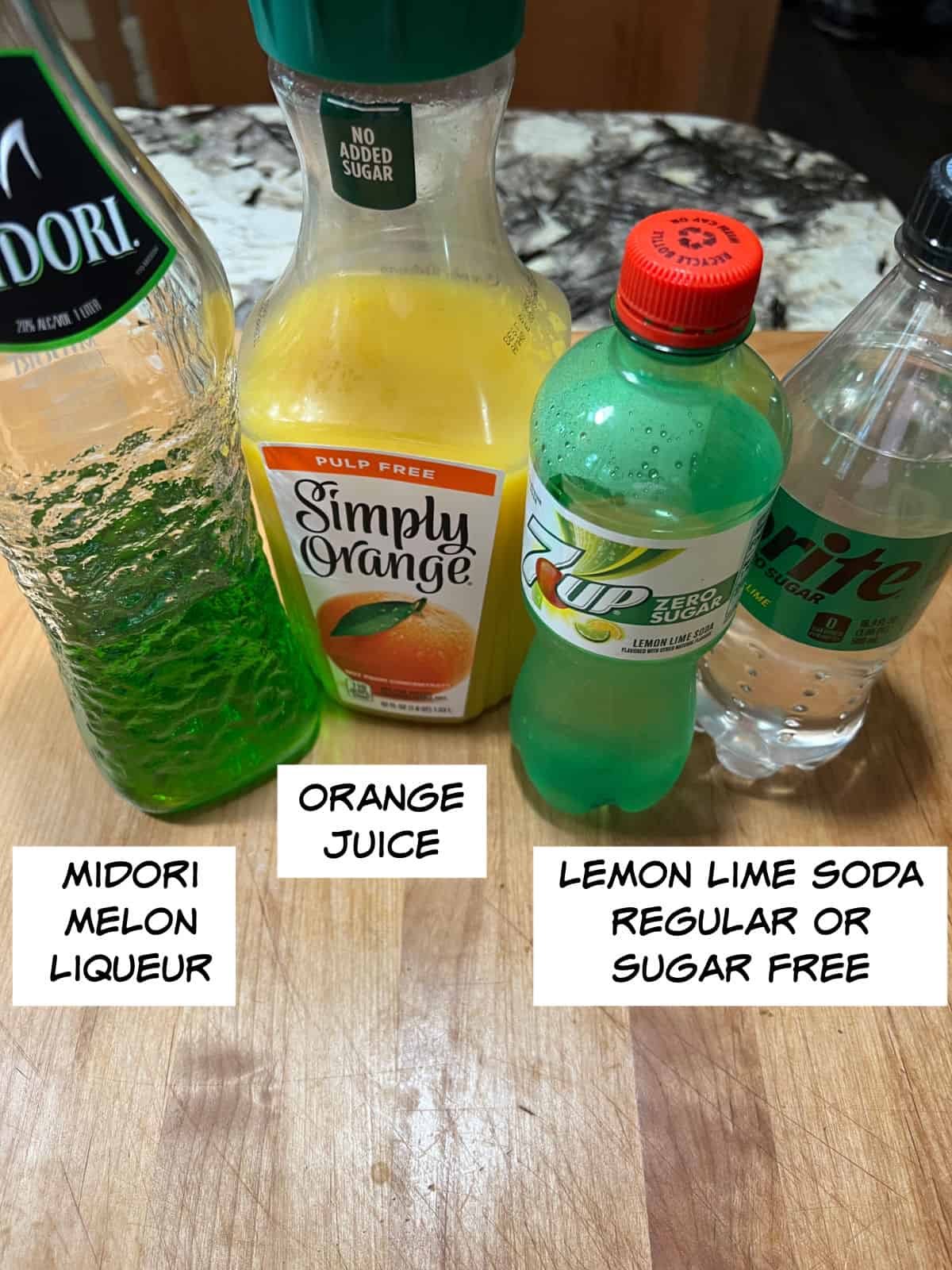 Ingredients: Midori melon liqueur, orange juice, and lemon lime soda.