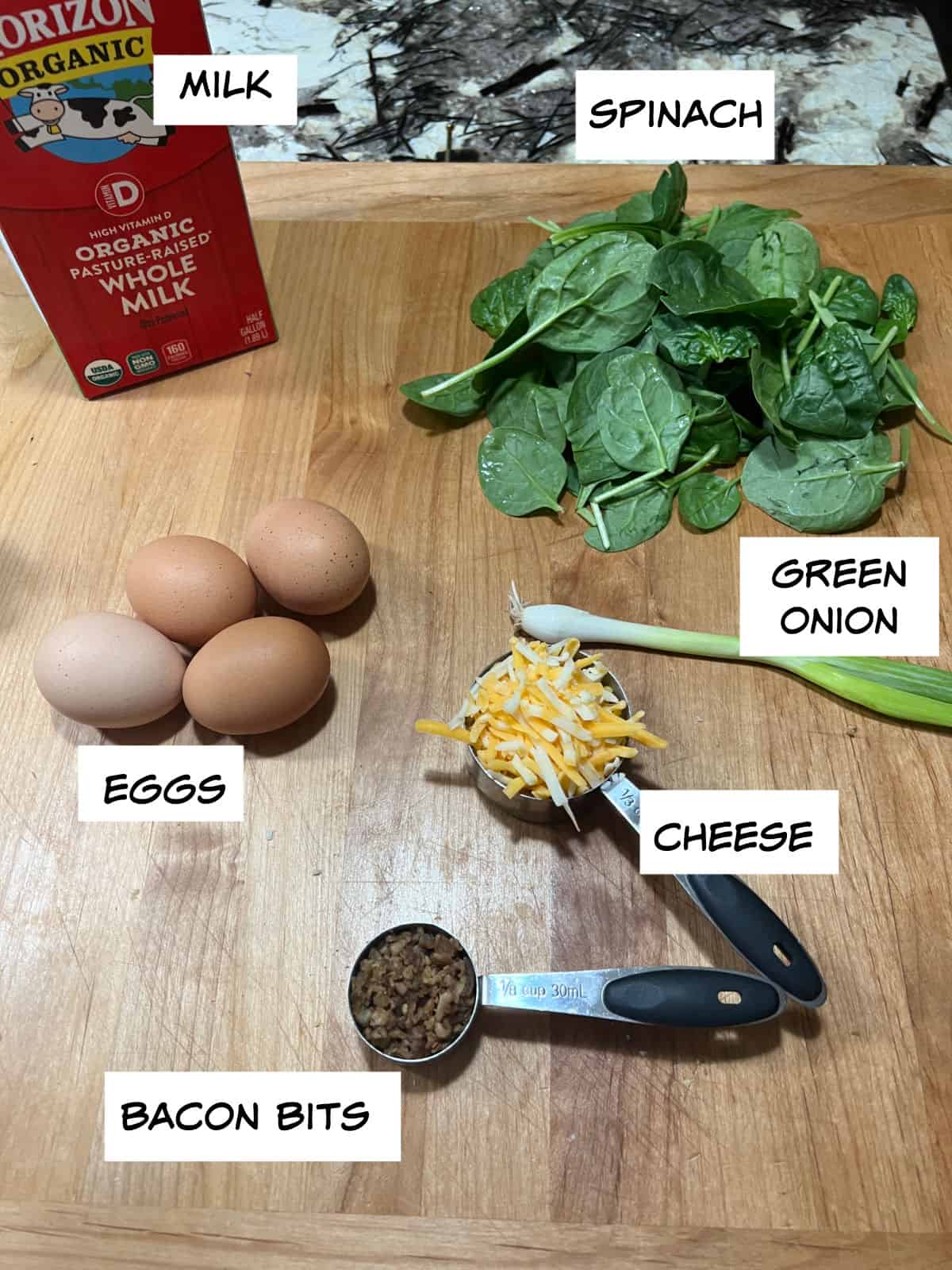 Ingredients: eggs, milk, spinach, green onion, cheese, bacon bits.