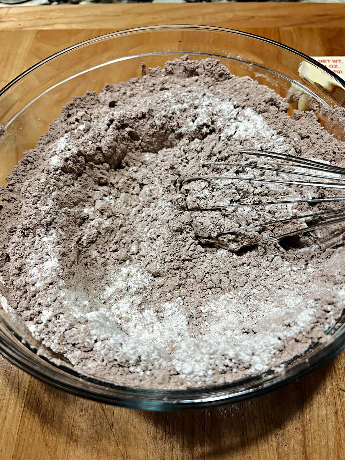 adding flour to the brownie mix.