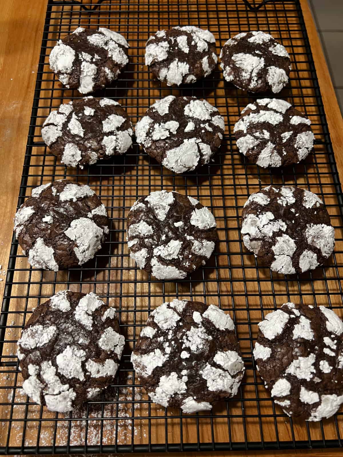 Brownie mix cookies cooling on a wire rack.