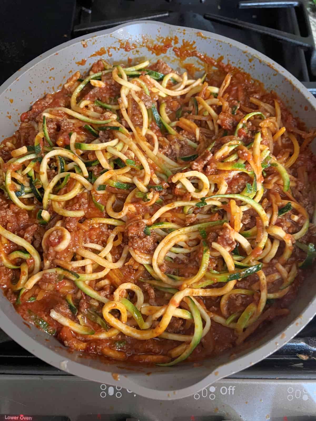 Spiralized zoodles and butternut squash noodles added to the spaghetti sauce.