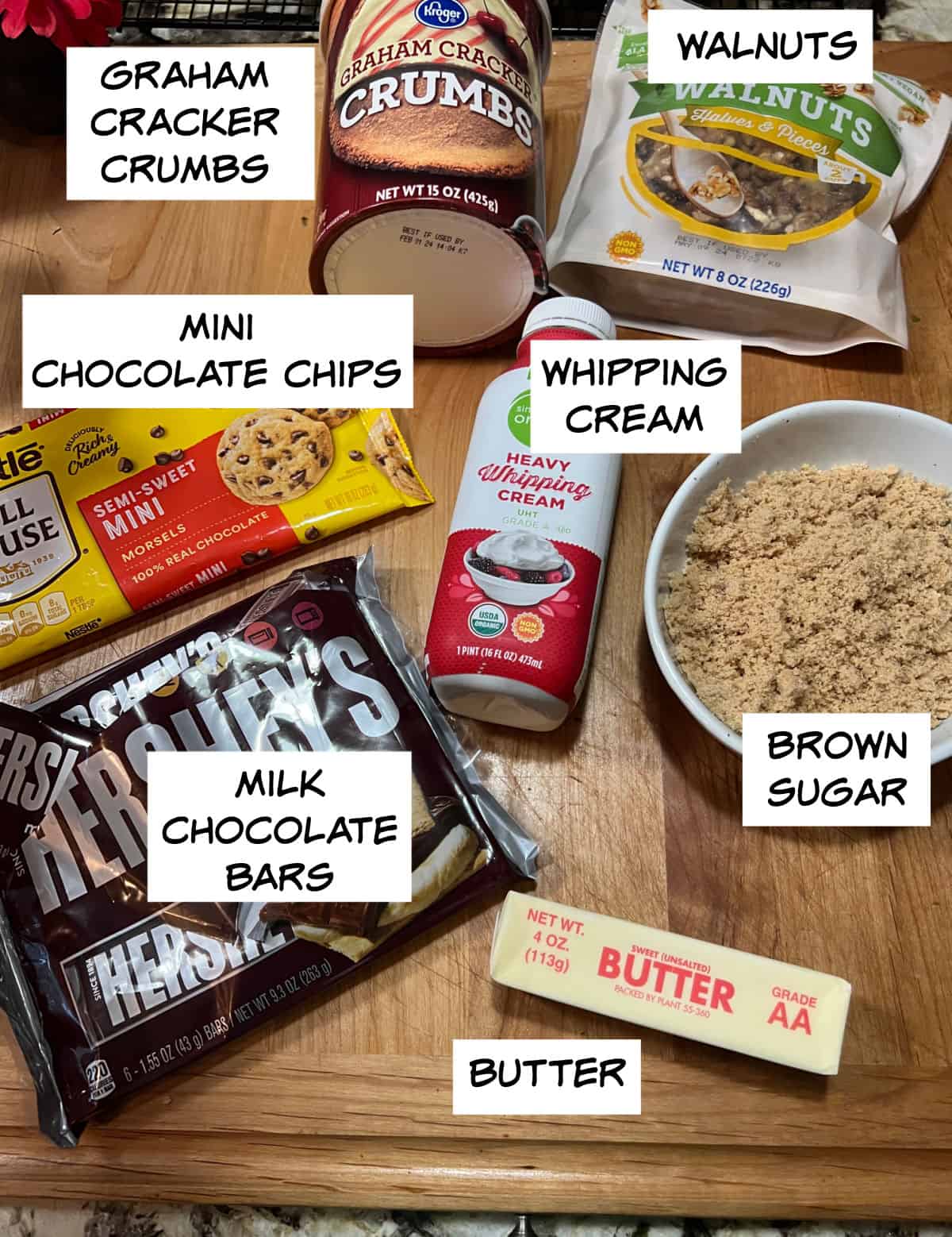 Ingredients: graham cracker crumbs, walnuts, mini chocolate chips, whipping cream, brown sugar, butter, milk chocolate bars.