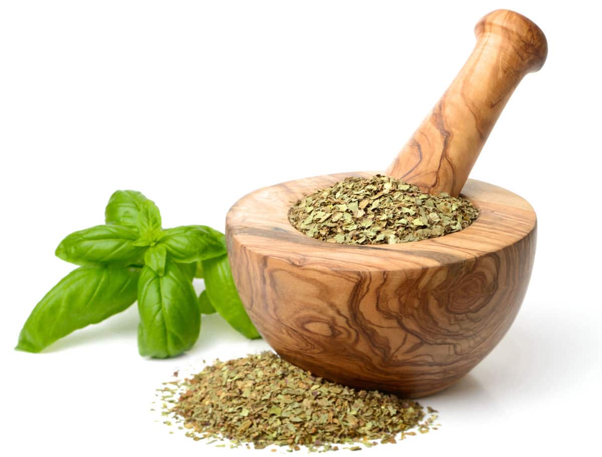 herbs on a mortar and pestle.