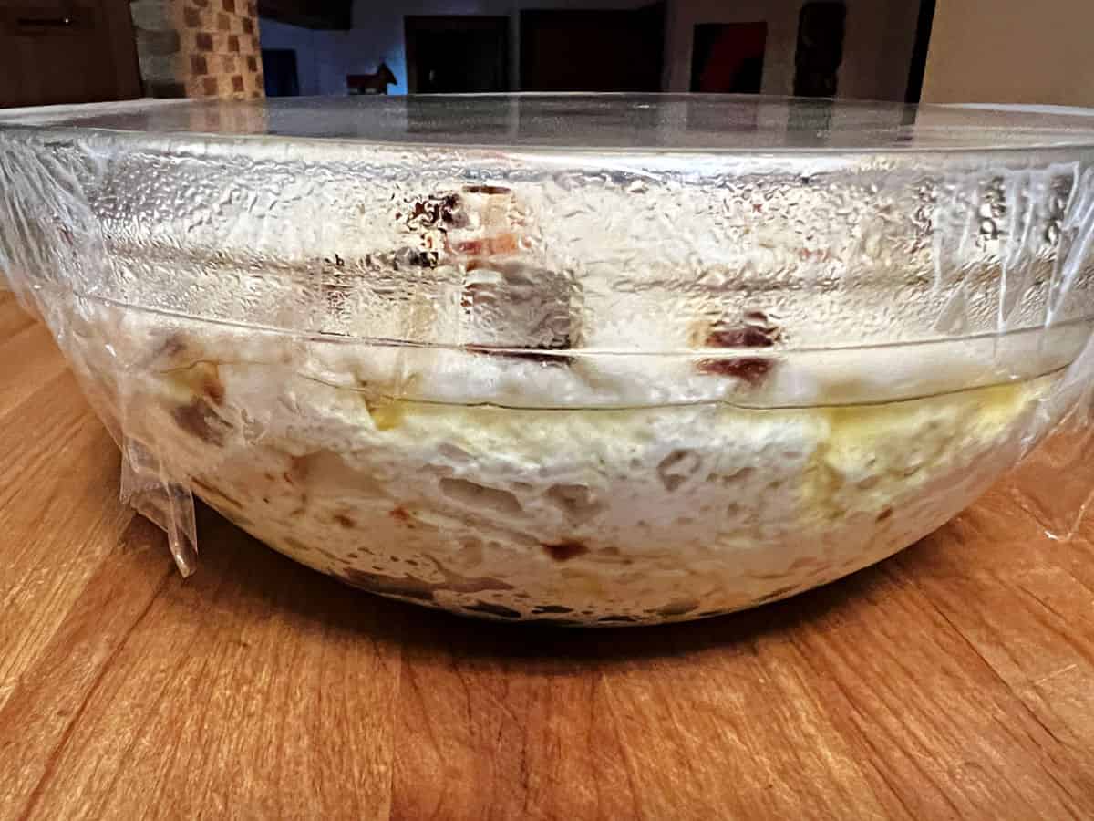 focaccia dough rising in a bowl.