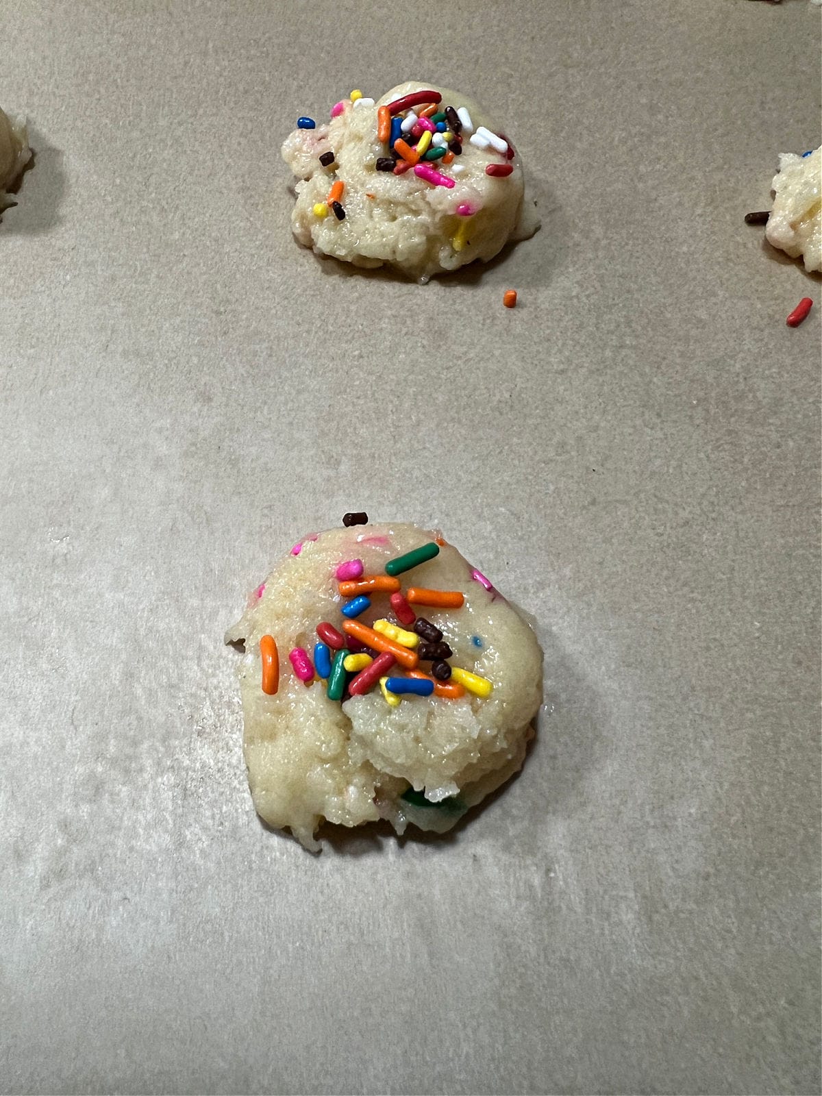 Extra sprinkles placed on top of the dough.