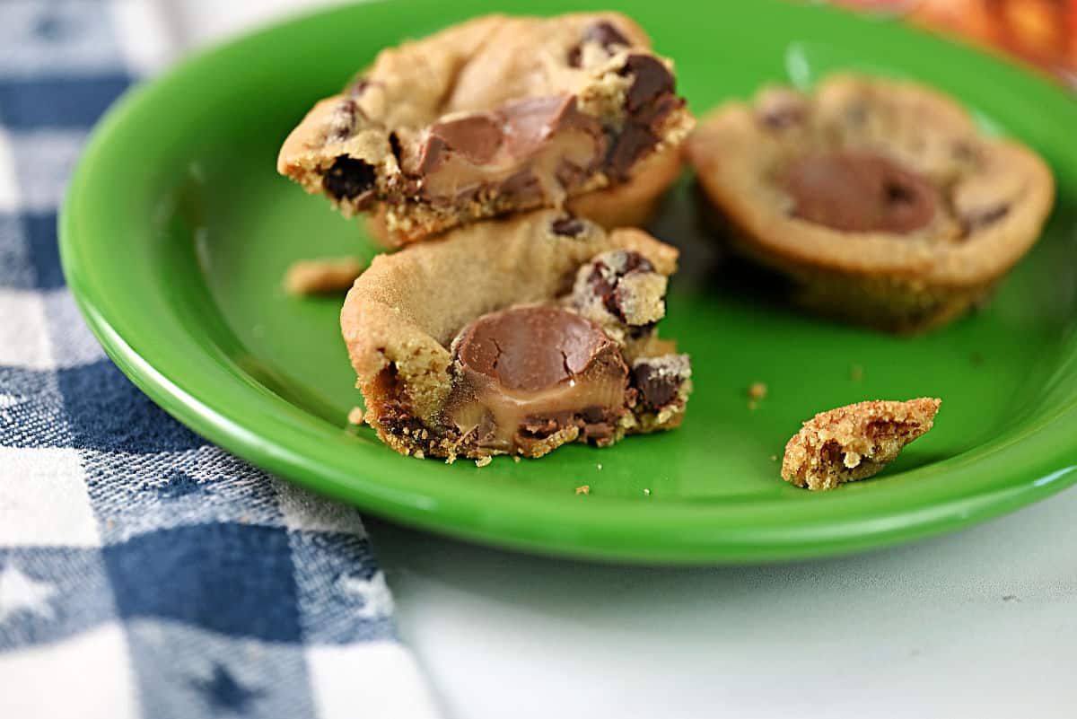 A cut open Rolo stuffed cookie showing the caramel center.