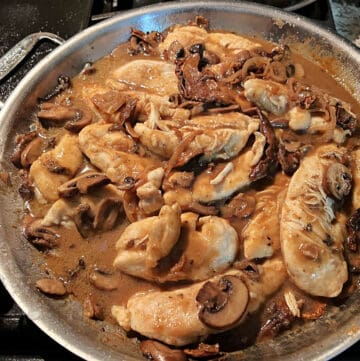 skillet of chicken tenders in Marsala and mushroom sauce.