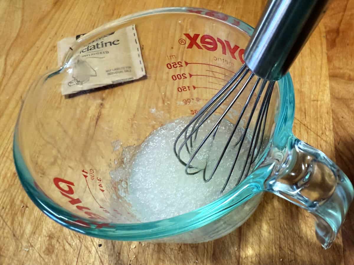 dissolving gelatin in water.