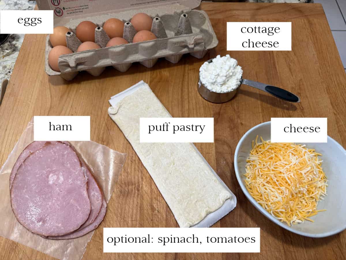 ingredients needed: eggs, puff pastry, cottage cheese, ham, and shredded cheese. Plus optional add ins noted.