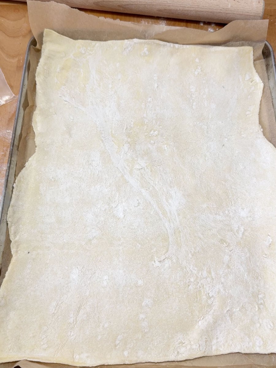 rolled out puff pastry on a parchment lined baking sheet.