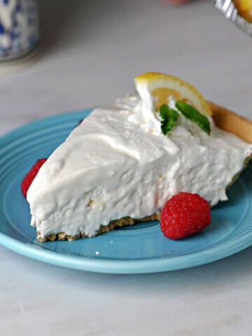 a slice of lemonade pie ready to enjoy.