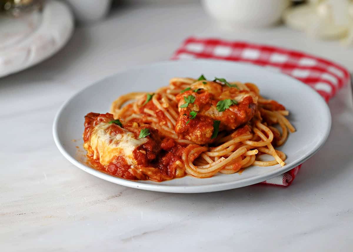Pork Parmesan with spaghetti, ready to eat.