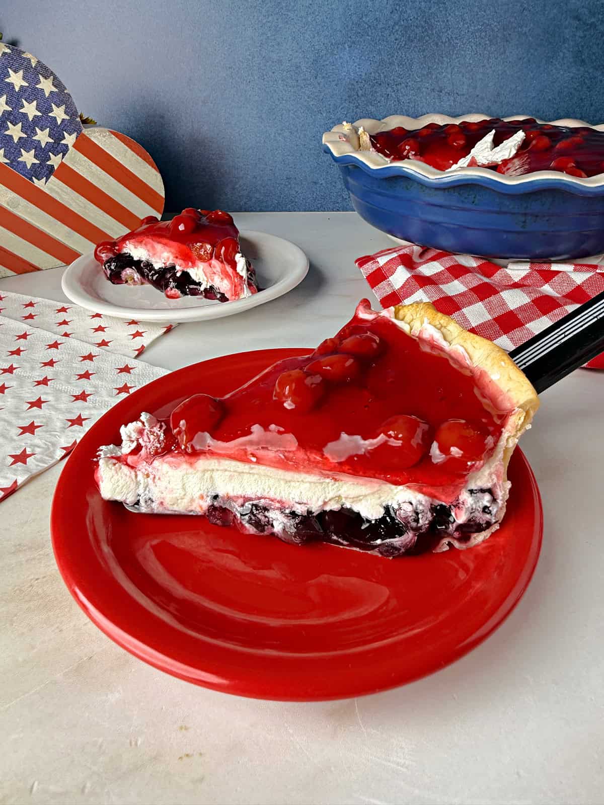 A slice of layered red white and blue pie.