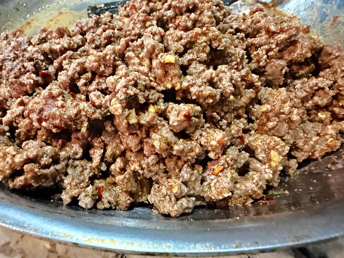 a skillet full of seasoned taco meat, ready to serve.