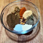 homemade taco seasoning spices in a small bowl, ready to mix.