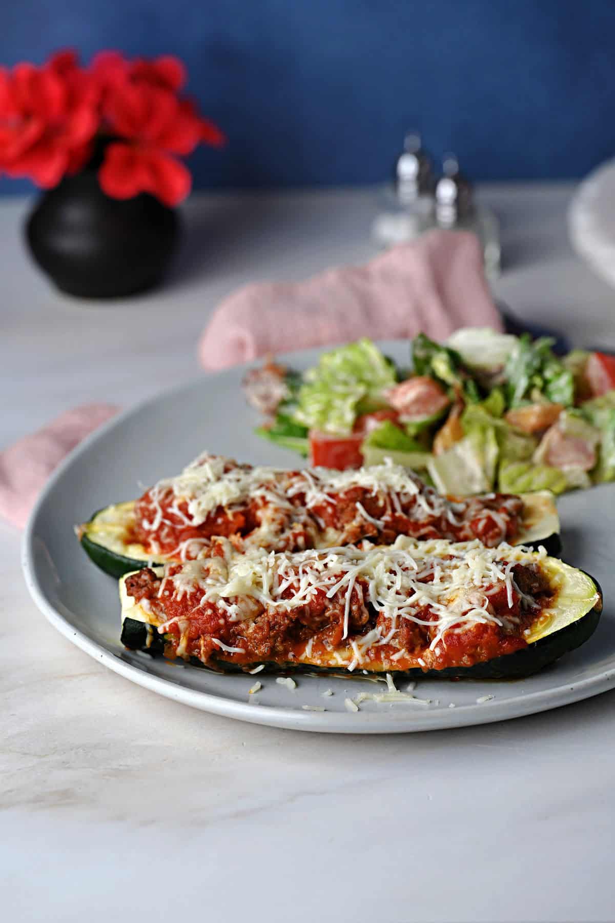 a plate with stuffed shells of zucchini.