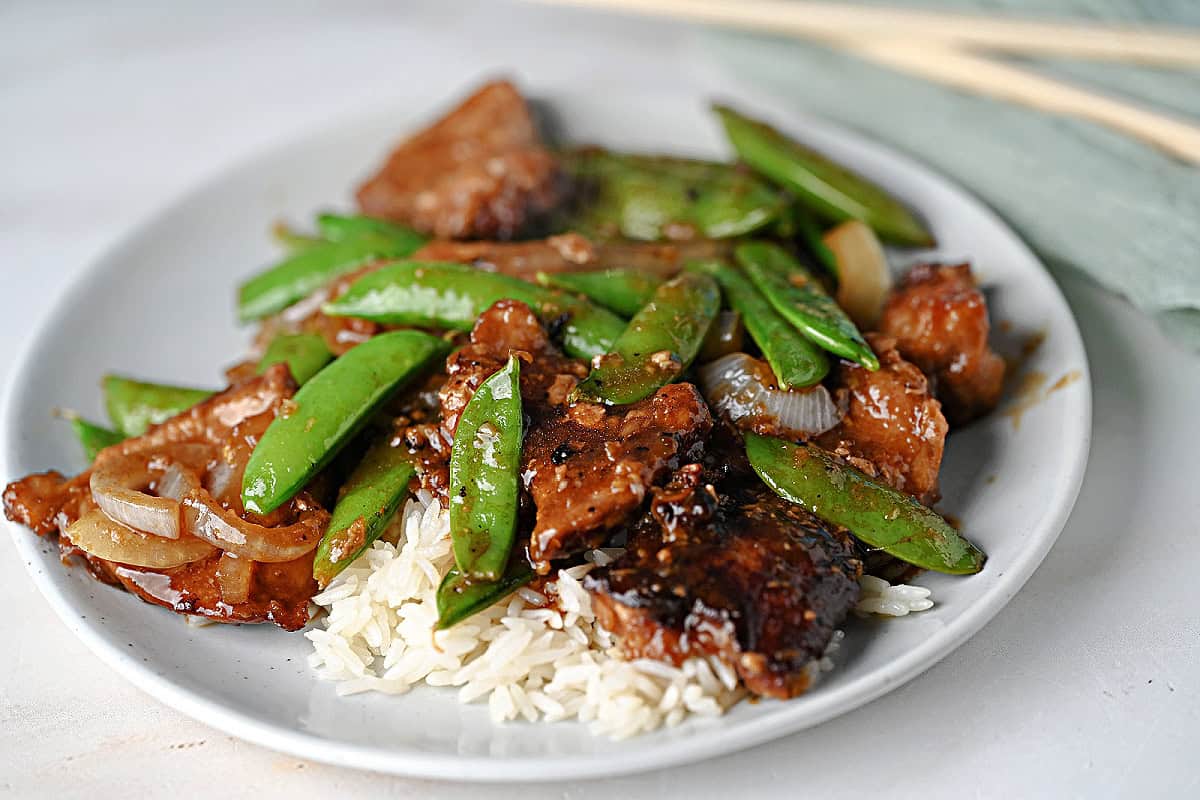 pork stir fry with snap peas.
